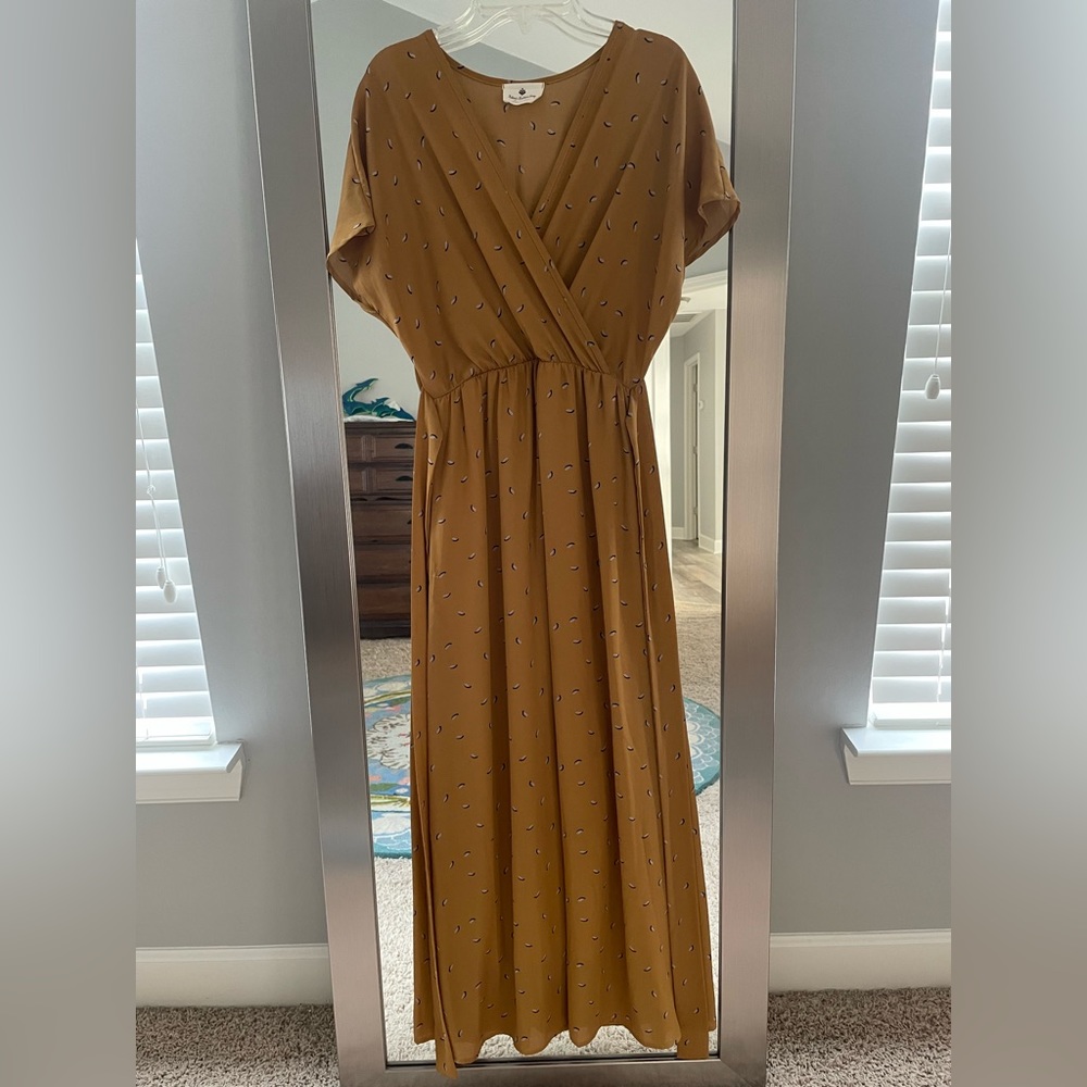 Mustard maxi with white/navy pattern.